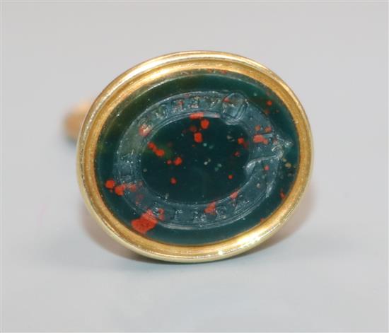 An early 20th century yellow metal and bloodstone set fob seal, 22mm.